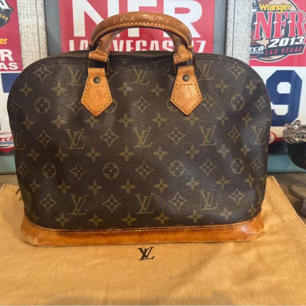 Louis Vuitton Alma PM Brown and Tan Interior Detail